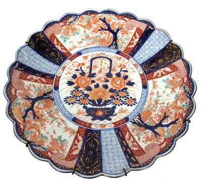 Lot 121A - A Japanese porcelain charger decorated with...