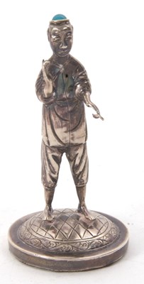 Lot 128 - A Chinese export white metal figure of a...