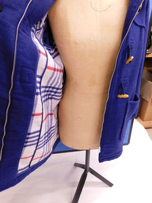 Lot 88 - A lady's blue wool mix duffle coat, with zip...