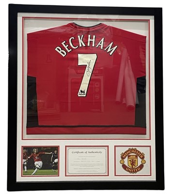 Lot 174 - A Manchester United football shirt, bearing...
