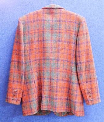 Lot 73 - A lady's Harris Tweed jacket, in orange, green...