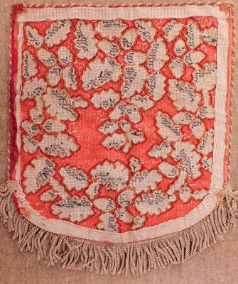 Lot 33 - A beaded screen/penant, the red needlework...