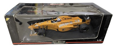 Lot 203 - A boxed Minichamps 1:18 scale model, the...