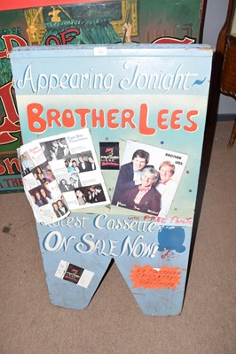 Lot 222 - Folding advertising board marked 'Appearing...