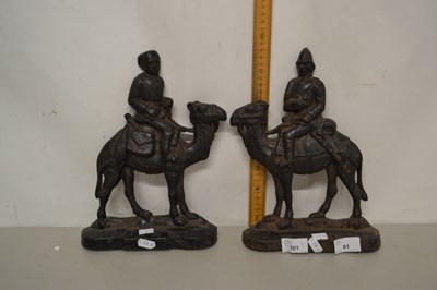 Lot 81 - Pair of iron door stops formed as figures on...