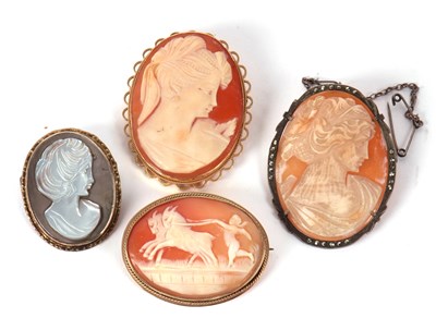Lot 37 - Four cameo brooches, to include a 9ct mounted...