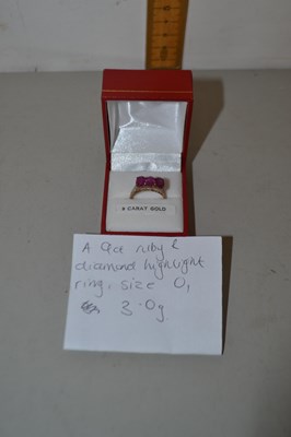 Lot 106 - 9ct ruby and diamond highlight ring, size O,...