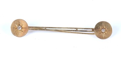 Lot 45 - A diamond bar brooch, set with a round disc to...