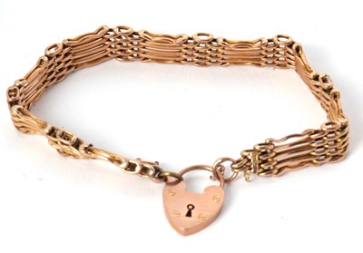 Lot 92 - A 9ct gate bracelet, 10mm wide, with...