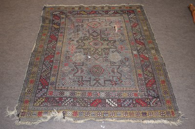 Lot 611 - Antique Middle Eastern wool carpet with...