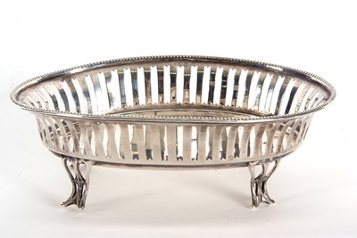 Lot 4 - An Edwardian silver oval dish having pierced...