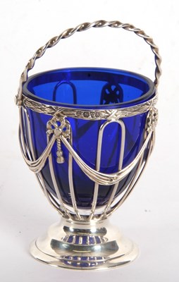 Lot 6 - An Edwardian silver sugar basket having strap...