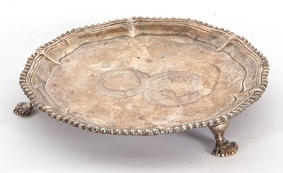 Lot 15 - A George III silver card salver of circular...