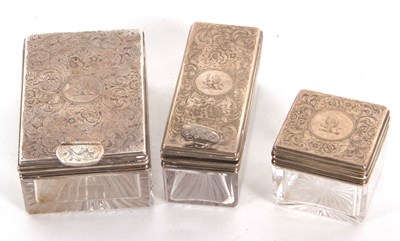 Lot 24 - Three Victorian glass and silver mounted gents...