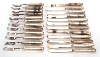 Lot 30 - Six pairs of George V silver handled dessert...