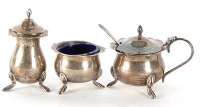 Lot 39 - A George V three piece silver condiment set...