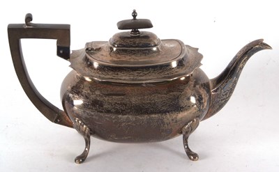 Lot 91 - A George V silver teapot of plain rectangular...