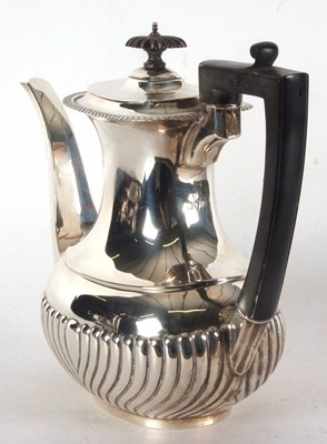 Lot 97 - A George V silver coffee pot, applied...