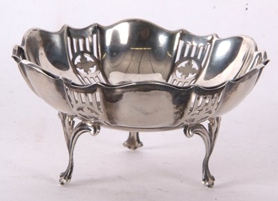 Lot 113 - A George V silver circular bonbon dish, having...