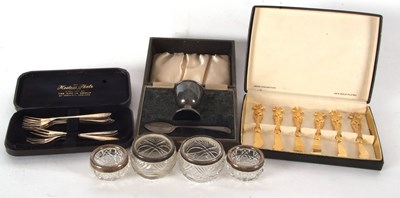 Lot 200 - A cased George V silver egg cup and spoon,...