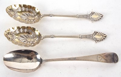 Lot 214 - A pair of Victorian silver berry spoons,...