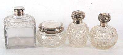 Lot 215 - A group of four glass dressing table...