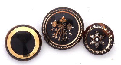 Lot 76 - Three tortoiseshell pique work brooches, the...