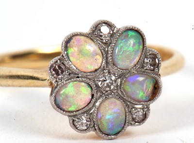 Lot 3 - An 18ct and platinum opal and diamond ring,...