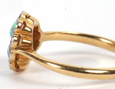 Lot 3 - An 18ct and platinum opal and diamond ring,...