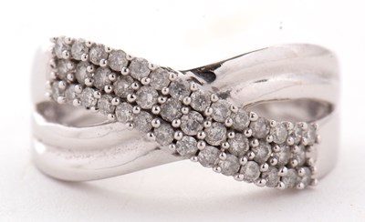 Lot 7 - A 9kt diamond crossover ring, with three...