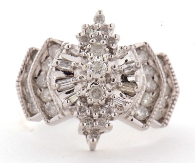 Lot 17 - A 14ct diamond ring, the Odeonesque style ring...