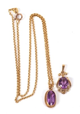 Lot 79 - Two amethyst pendants, the first a 9ct oval...