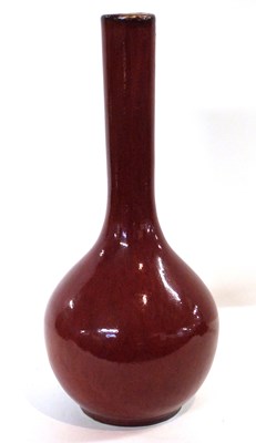 Lot 313 - A Chinese flambe bottle vase, in a sdb glaze,...
