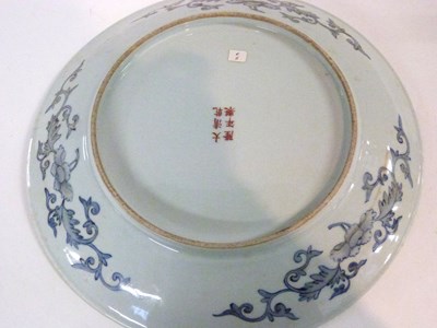 Lot 295 - A large Chinese porcelain charger decorated...
