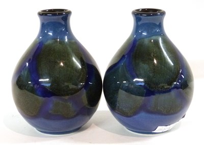 Lot 316 - A small pair of Poole vases of baluster shape,...