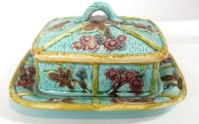 Lot 328 - A Maiolica dish and cover, decorated in relief...