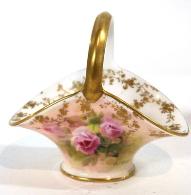 Lot 386 - A small Royal Doulton basket painted with...