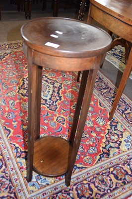 Lot 512 - An Edwardian circular mahogany two tier plant...