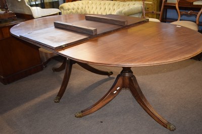 Lot 585 - A Georgian style mahogany twin pedestal dining...
