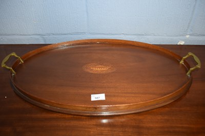 Lot 587 - An Edwardian mahogany galleried oval serving...
