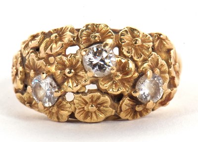 Lot 77 - An 18ct three stone diamond ring, the three...