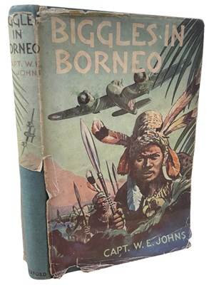 Lot 23 - W E JOHNS: BIGGLES IN BORNEO, London, OUP,...