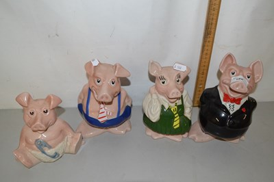 Lot 186 - Set of four Wade Nat West piggy banks