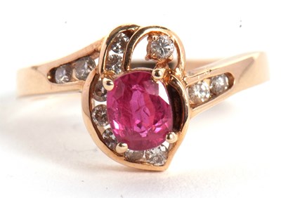 Lot 48 - A 14k ruby and diamond ring, the central four...