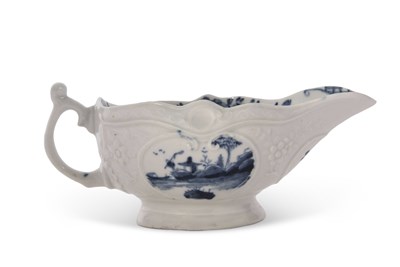 Lot 82 - A rare Worcester porcelain sauce boat with...