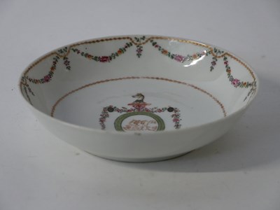 Lot 229 - A small Chinese Export armorial dish with the...