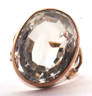 Lot 28 - A citrine ring, the oval mixed cut citrine in...