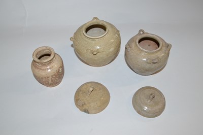 Lot 307 - Group of two Chinese pottery jars with lids...