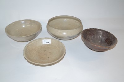 Lot 309 - Group of four Chinese pottery bowls, possibly...