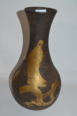 Lot 319 - A Japanese iron vase of baluster form...